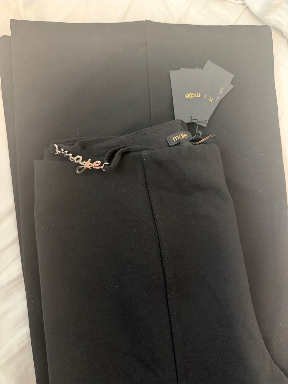 Maje Black Pants with Gold Logo Charm